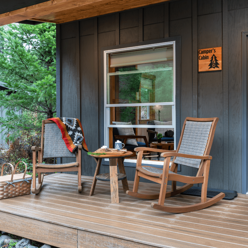 IMAGE OF ROCKING CHAIRS ON PORCH AT CAMPER'S CABIN AT BACKWOODS CABINS